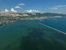 Top view of the bay Tsemess. Mol - building to stop the waves. photo