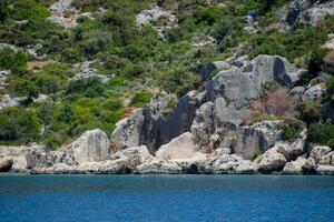 restos de el antiguo ciudad de kekova en el costa. foto