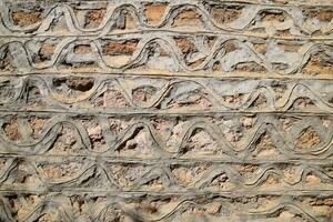 texture of cement and limestone walls with bricks. photo