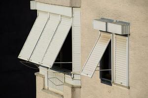 External blinds on the windows for protection from the sun's rays. photo