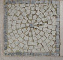 Stone floor pattern with crack gray background close up photo