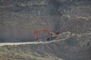 Large quarry for gravel mining, sand and clay. Mining machines and units. Mining photo