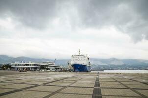 The square in front of the city of Novorossiysk naval station. Ship in marskogo station. photo