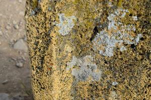 Limestone stone nearby. Stone blocks with traces of stone machining. Fragments of ancient buildings photo