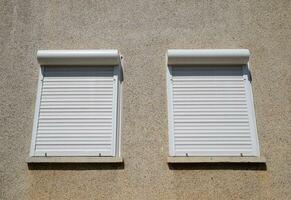 External blinds on the windows for protection from the sun's rays. photo