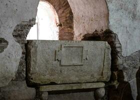 Sarcophagus in church of St. Nicholas in Demre Turkey. photo