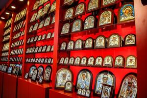 Orthodox icons on the shop counter. photo