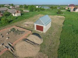 Top view of the garage in a private plot of land photo
