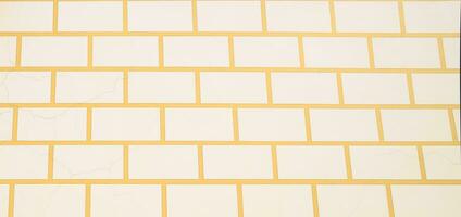 Background texture white bricks and yellow cement. Masonry of stone. photo