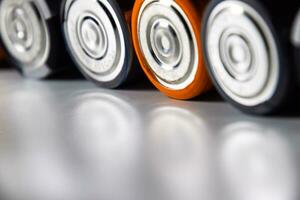 Salt and alkaline batteries, source of energy for portable technology. AAA and AA batteries photo