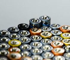 Salt and alkaline batteries, source of energy for portable technology. AAA and AA batteries photo