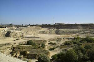 Large quarry for gravel mining, sand and clay. Mining machines and units. Mining photo