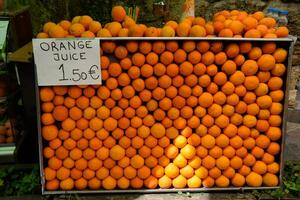 Oranges on the counter. Selling oranges. Citrus fruit. photo