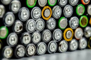 Salt and alkaline batteries, source of energy for portable technology. AAA and AA batteries photo