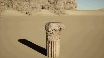 A stone pillar in the middle of a desert video