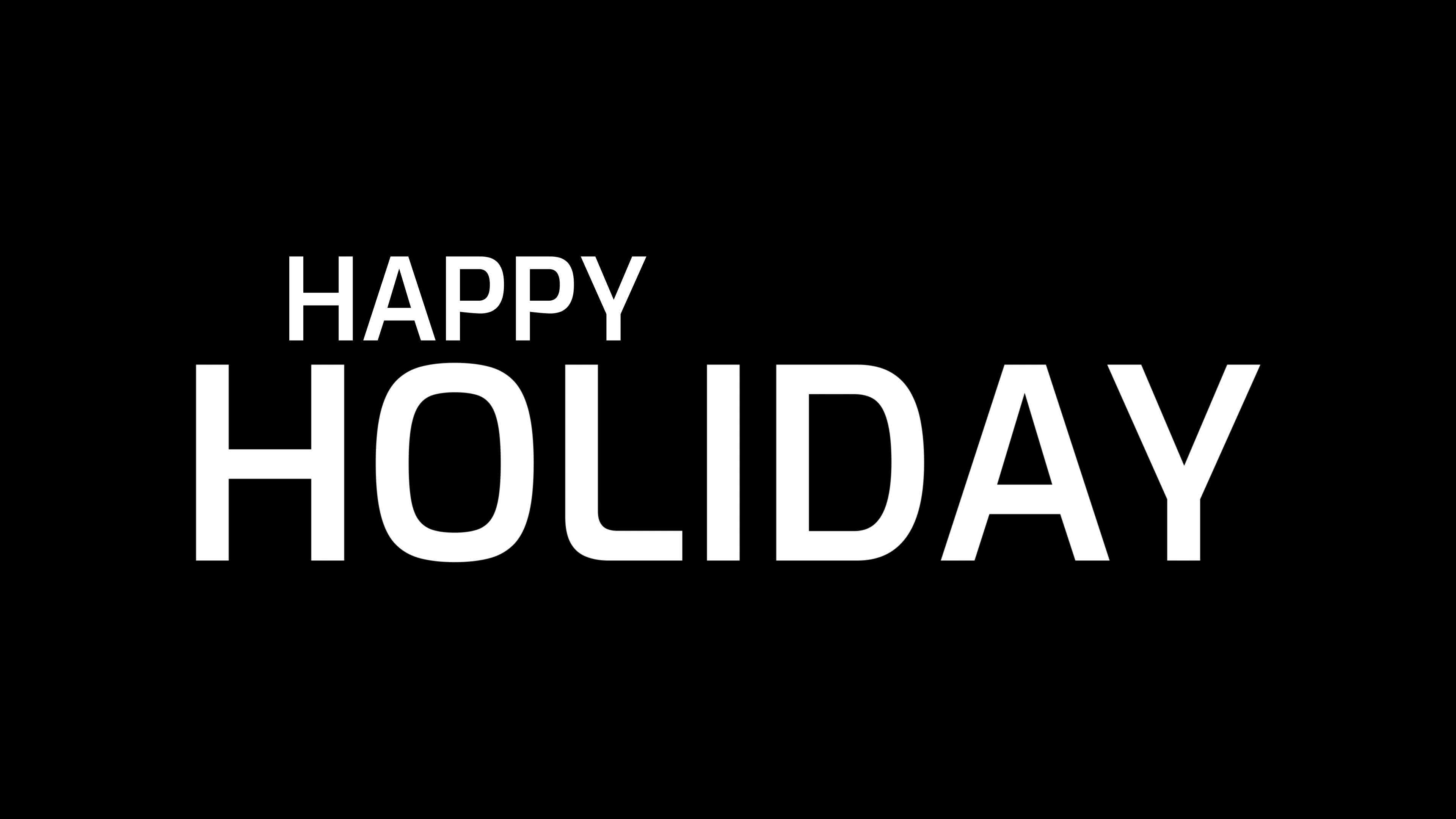 Animated happy holiday with cinematic zoom text effect in black and ...