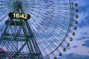 A dusk ferris wheel in Yokohama telephoto shot photo