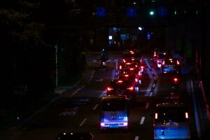 A night traffic jam at the city street in Tokyo telephoto shot photo