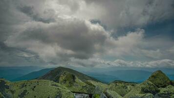 Time lapse of beautiful clouds move over the mountains video