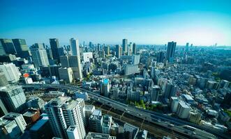 A panorama cityscape near the railway in Osaka wide shot photo