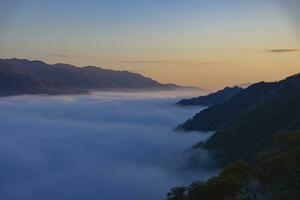 A sea of clouds at the top of the mountain in Kyoto telephoto shot photo