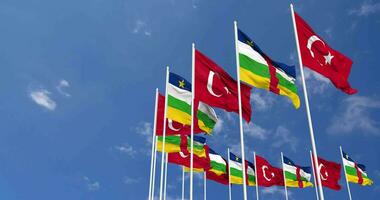 Central African Republic and Turkey Flags Waving Together in the Sky, Seamless Loop in Wind, Space on Left Side for Design or Information, 3D Rendering video