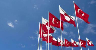 Greenland and Turkey Flags Waving Together in the Sky, Seamless Loop in Wind, Space on Left Side for Design or Information, 3D Rendering video