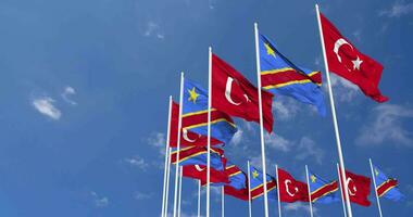 DR Congo and Turkey Flags Waving Together in the Sky, Seamless Loop in Wind, Space on Left Side for Design or Information, 3D Rendering video