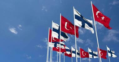 Finland and Turkey Flags Waving Together in the Sky, Seamless Loop in Wind, Space on Left Side for Design or Information, 3D Rendering video