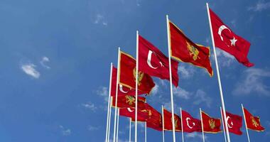 Montenegro and Turkey Flags Waving Together in the Sky, Seamless Loop in Wind, Space on Left Side for Design or Information, 3D Rendering video
