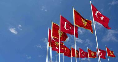 Montenegro and Turkey Flags Waving Together in the Sky, Seamless Loop in Wind, Space on Left Side for Design or Information, 3D Rendering video