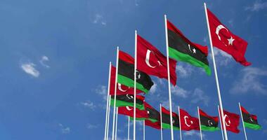 Líbia e Peru bandeiras acenando juntos dentro a céu, desatado ciclo dentro vento, espaço em esquerda lado para Projeto ou Informação, 3d Renderização video