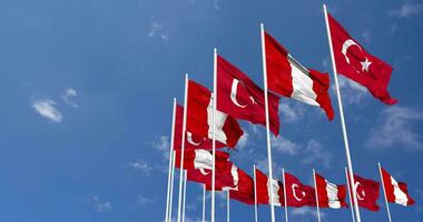 Peru and Turkey Flags Waving Together in the Sky, Seamless Loop in Wind, Space on Left Side for Design or Information, 3D Rendering video