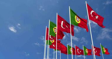 Portugal and Turkey Flags Waving Together in the Sky, Seamless Loop in Wind, Space on Left Side for Design or Information, 3D Rendering video