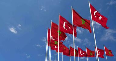 Morocco and Turkey Flags Waving Together in the Sky, Seamless Loop in Wind, Space on Left Side for Design or Information, 3D Rendering video