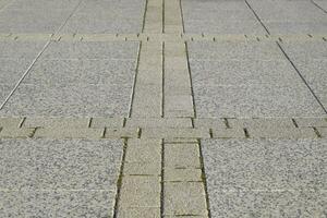 Figure out the paving slabs in the square. Background of paving photo