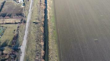 The channel of the lower level of the irrigation system of fields. Infrastructure for the cultivation of rice photo