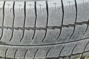 Hoarfrost on a rubber tire wheel photo