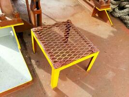 Stool for a stand made of steel, welded to the deck. photo