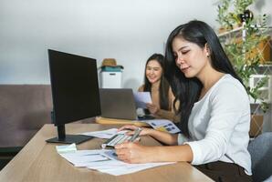 Accountant Or Auditor working With computer in office photo