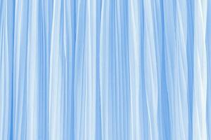 Abstract background of soft pleats of blue color quilled fabric. Festive background for design. A copy space. Design mockup photo