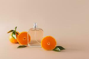 A chic bottle of women's perfume with a delicate aroma with notes of tangerine on a pastel background with ripe fruit. An original smell of freshness photo