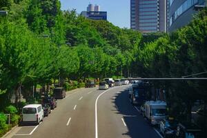 A traffic jam at the urban street in Tokyo telephoto shot photo