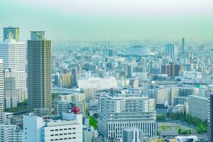 un oscuridad paisaje urbano por alto ángulo ver cerca kyocera Hazme en Osaka foto