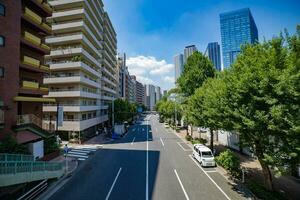 A traffic jam at the urban street in Tokyo wide shot photo