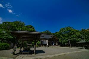 A Japanese traditional temple JINDAIJI at the old fashioned street in Tokyo wide shot photo