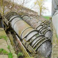 Outlet pipes of a water pumping station. Pipes of large diameter photo