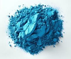 AI generated Isolated blue holi powder on white background, holi festival images hd photo