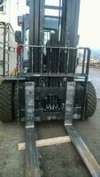 Forklift truck in the industrial cargo port. Service vehicles photo