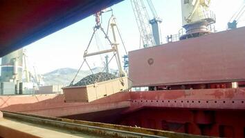 The type of port cranes in the background of the landscape of the port and port area photo